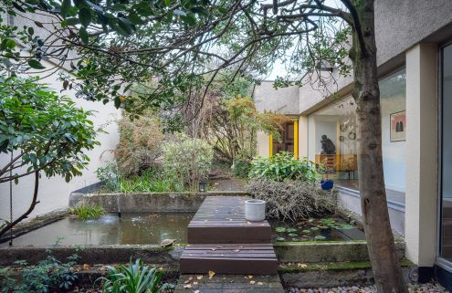 Picture yourself in this bohemian U-shaped house designed by Abraham & Rol