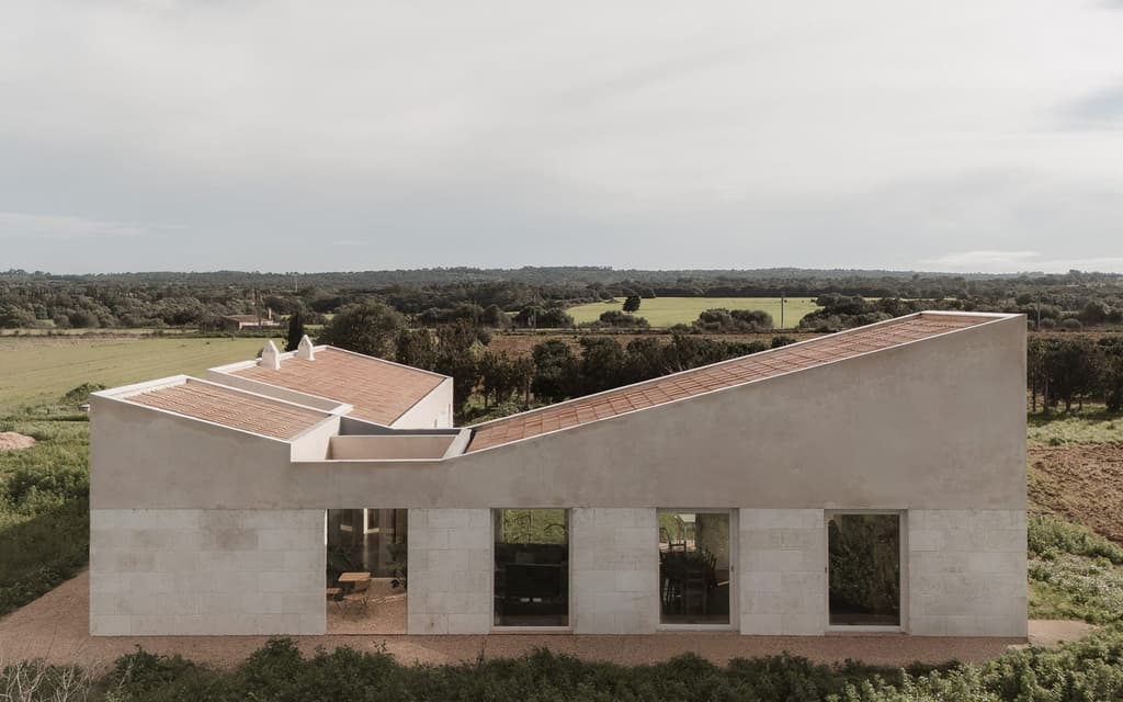 A low-slung Mallorcan finca opens toward the Tramuntana mountains