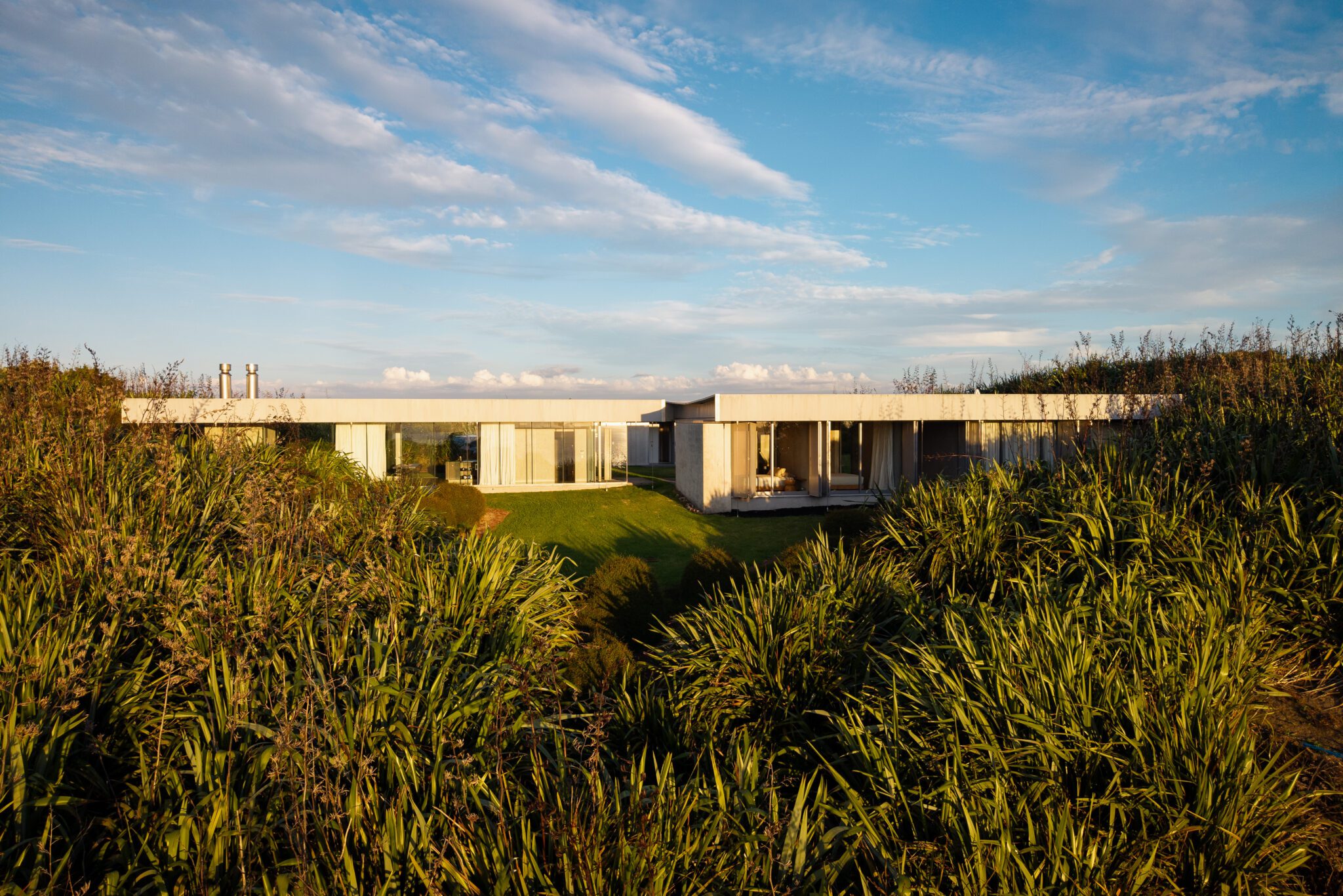 Concrete pavilions shape this New Zealand retreat by Fearon Hay