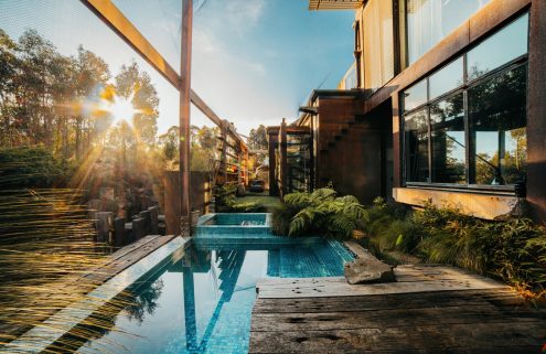 Water meets glass at this off-grid house in Australia’s southeast