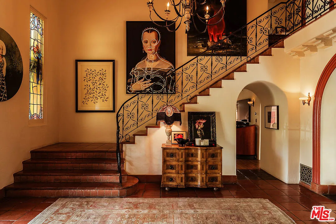 A baronial staircase anchors this 1928 villa in Los Feliz