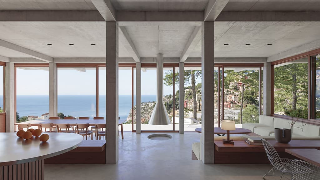 A concrete villa by Isla Architects overlooks the Balearic Sea