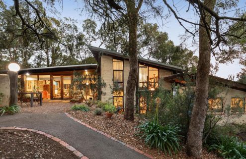 In the bushland outside Melbourne, a midcentury mudbrick chalet looks for a new owner