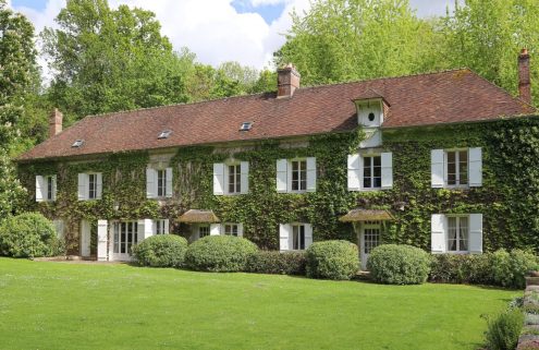 Tour this ivy-coated water mill, set within eight hectares of French countryside