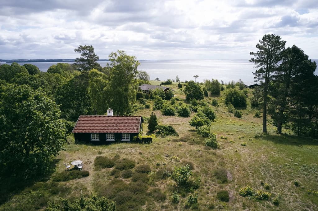 A 1949 summer house overlooks the glacial landscape of Djursland, Denmark