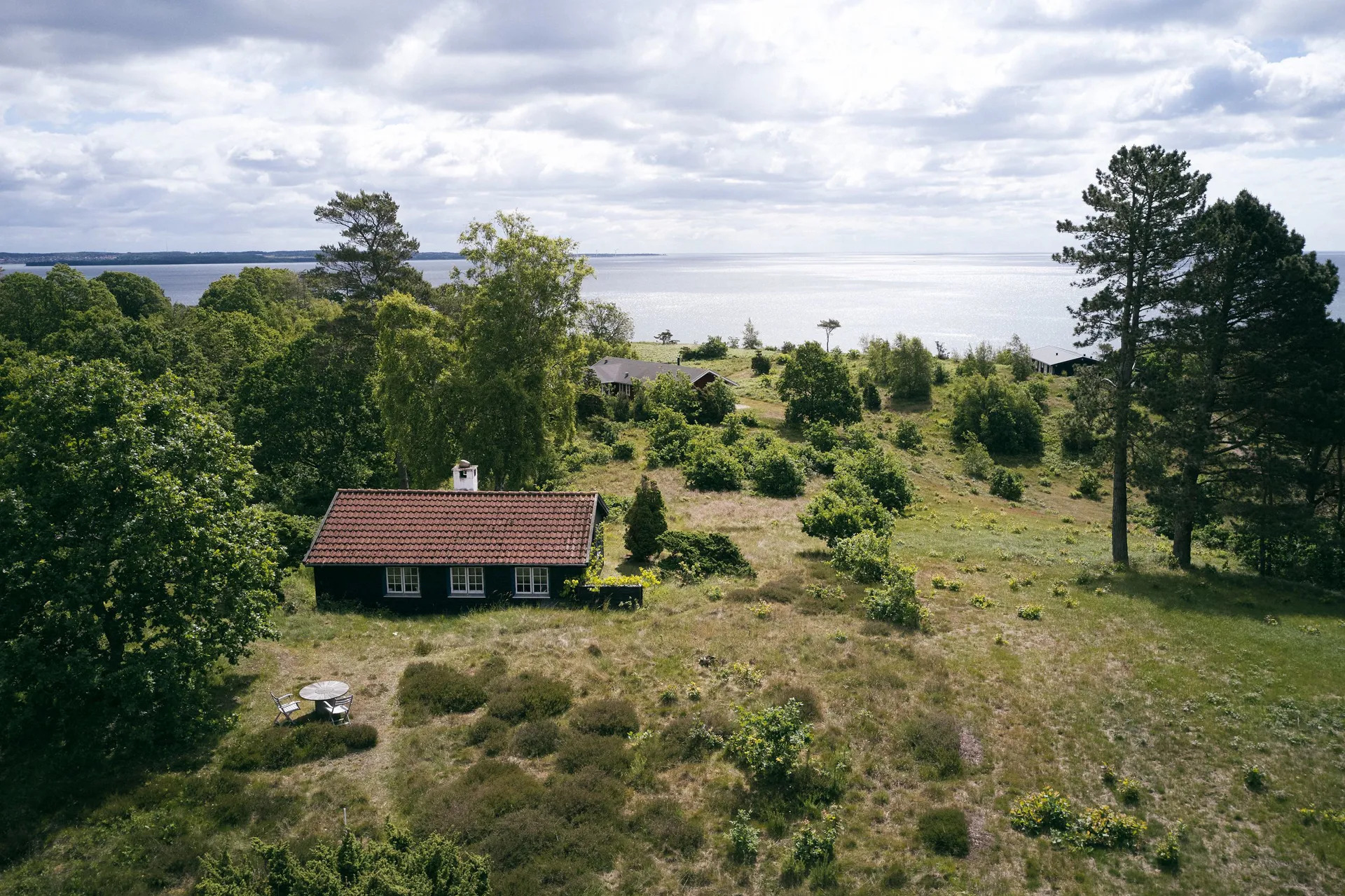 A 1949 summer house overlooks the glacial landscape of Djursland, Denmark
