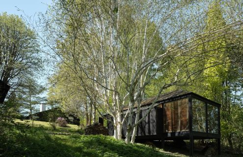 A four-building forest retreat comes up for sale on the Danish seaside