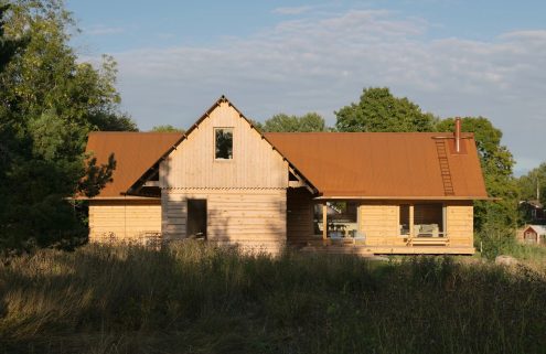 Peek inside these two Swedish timber farmsteads, built to sell