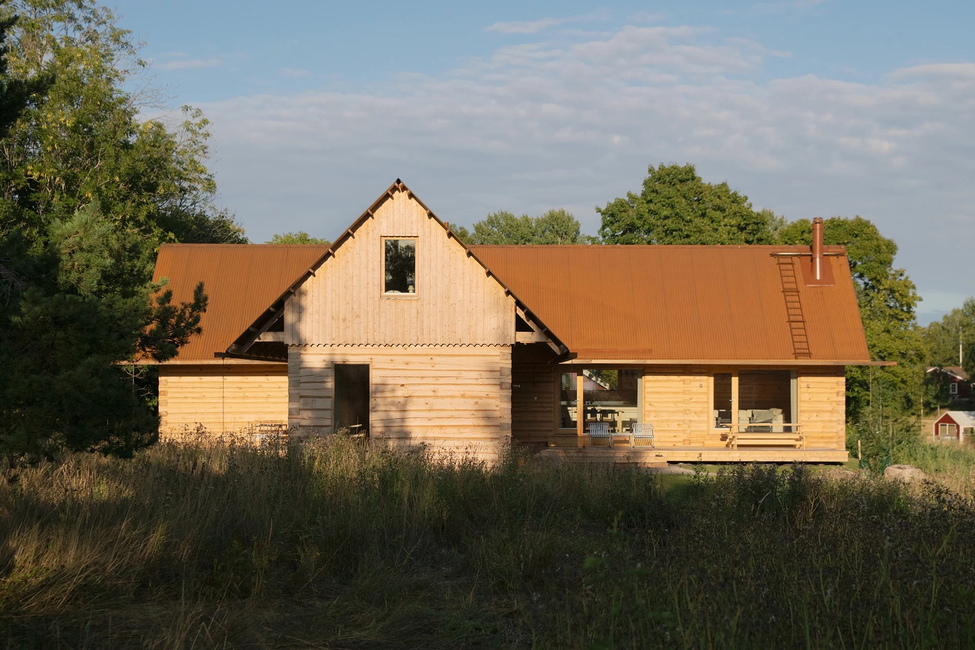 Peek inside these two Swedish timber farmsteads, built to sell