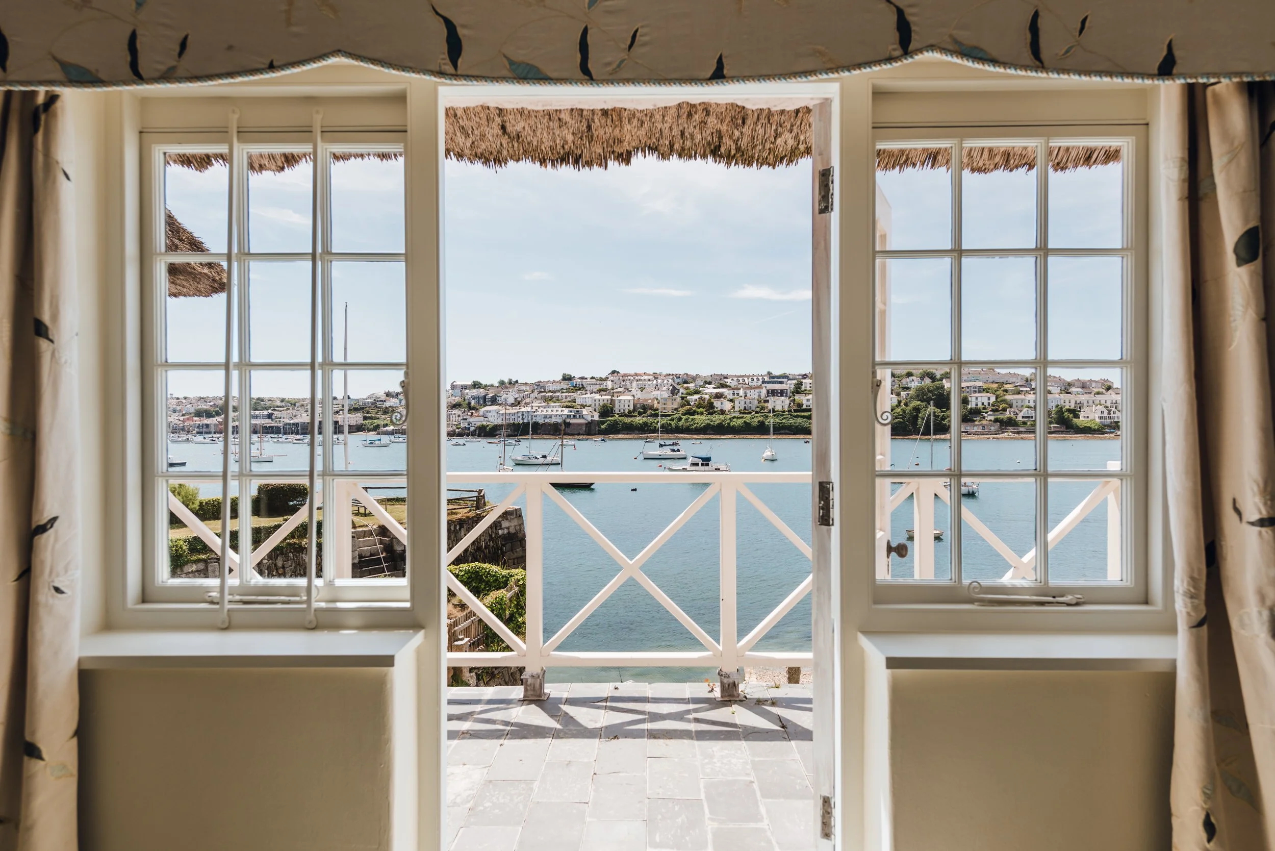 Falmouth looks like a fantasy from this thatched Cornish cottage