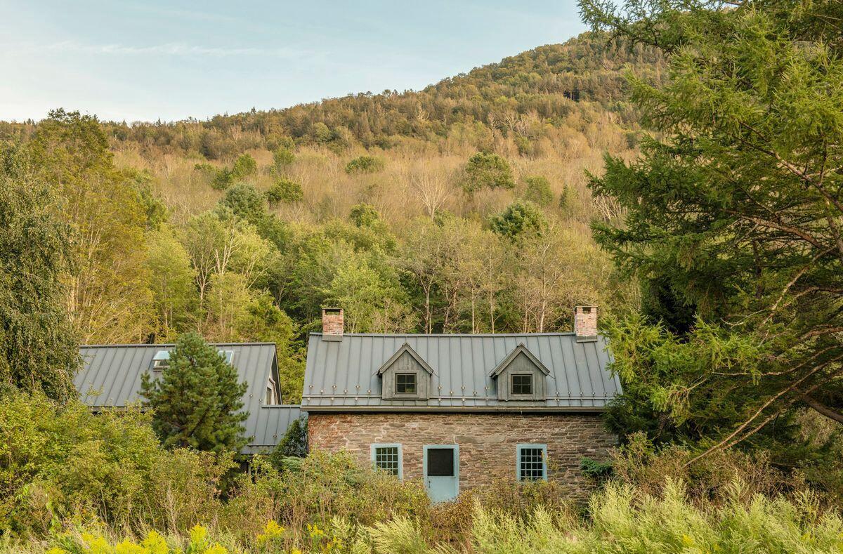 This 1783 cottage sits on 155 acres of Catskills landscape